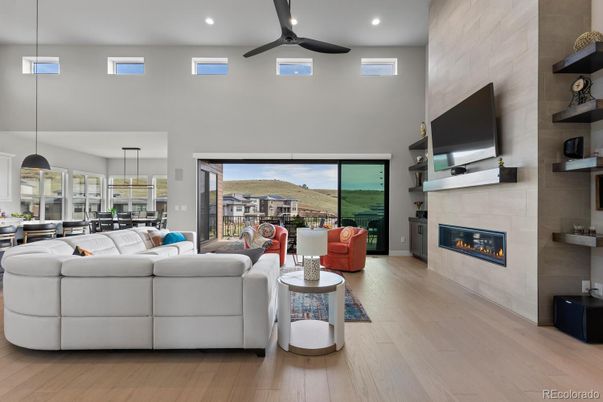 Dining room, Fireplace, Interior, Living room, Pendant Lights, Recessed Lighting, Wood Texture Flooring