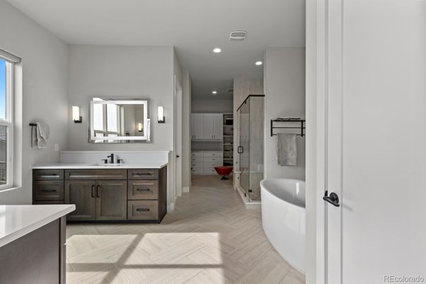 Bathroom, Dual Sink Vanities, Free Standing Baths, Interior, Recessed Lighting, Wood Texture Flooring