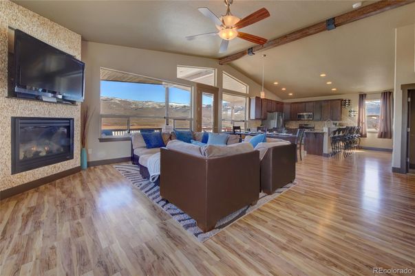 Dining room, Fireplace, Interior, Kitchen, Living room, Recessed Lighting, Wood Texture Flooring