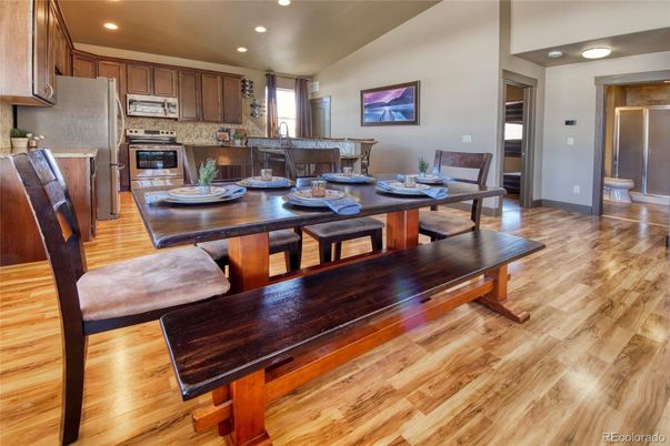 Dining room, Interior, Kitchen, Recessed Lighting, Stainless Steel Appliances, Wood Texture Flooring