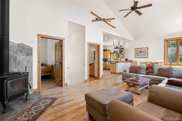 Fireplace, Interior, Kitchen, Living room, Recessed Lighting, Wood Texture Flooring