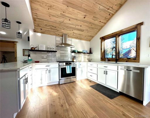 Interior, Kitchen, Pendant Lights, Recessed Lighting, Stainless Steel Appliances, Wooden Ceilings, Wood Texture Flooring