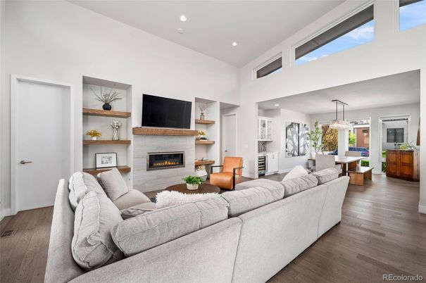 Dining room, Fireplace, Interior, Living room, Pendant Lights, Recessed Lighting, Wood Texture Flooring