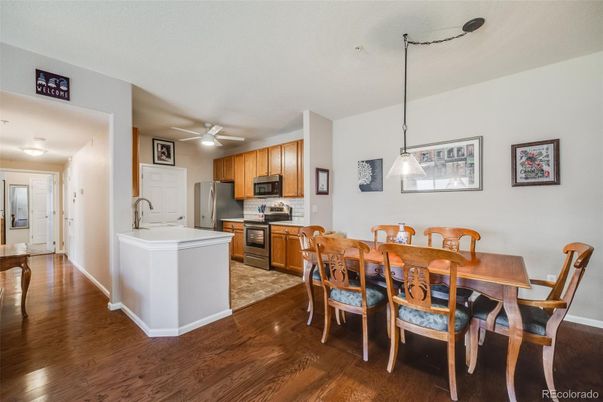 Dining room, Interior, Kitchen, Pendant Lights, Stainless Steel Appliances, Wood Texture Flooring