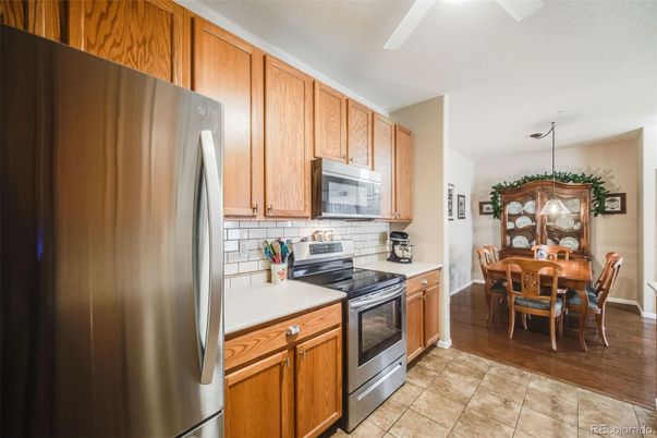 Dining room, Interior, Kitchen, Pendant Lights, Stainless Steel Appliances, Wood Texture Flooring