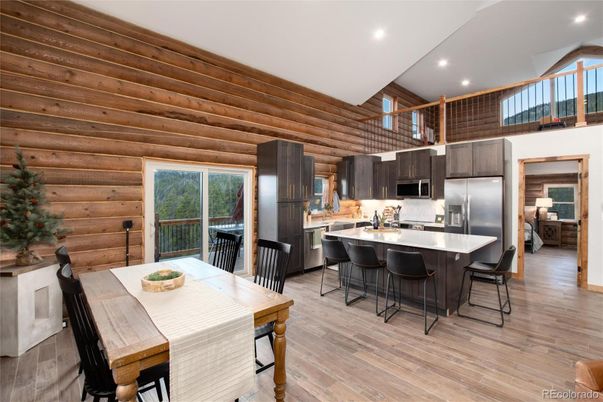 Dining room, Interior, Kitchen, Recessed Lighting, Stainless Steel Appliances, Wood Texture Flooring, Wooden Walls