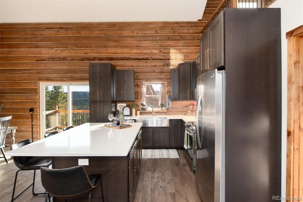 Interior, Kitchen, Stainless Steel Appliances, Wood Texture Flooring, Wooden Walls