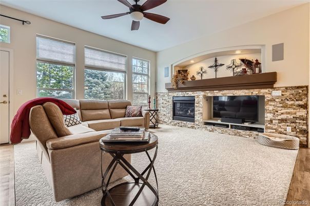 Fireplace, Interior, Living room, Recessed Lighting, Stone Walls, Wood Texture Flooring
