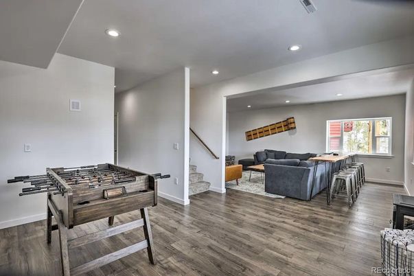 Dining room, Game Room, Interior, Living room, Recessed Lighting, Wood Texture Flooring
