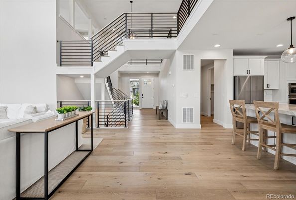 Dining room, Interior, Kitchen, Pendant Lights, Recessed Lighting, Stainless Steel Appliances, Wood Texture Flooring