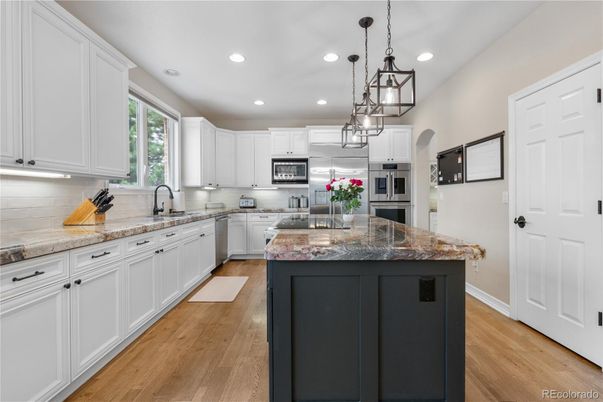Interior, Kitchen, Pendant Lights, Recessed Lighting, Stainless Steel Appliances, Wood Texture Flooring