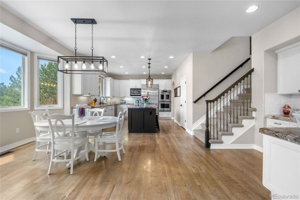 Dining room, Interior, Kitchen, Pendant Lights, Recessed Lighting, Stainless Steel Appliances, Wood Texture Flooring