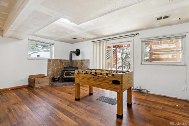 Fireplace, Game Room, Interior, Wood Texture Flooring