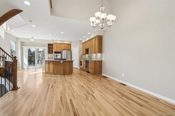 Chandelier, Interior, Kitchen, Recessed Lighting, Stainless Steel Appliances, Wood Texture Flooring