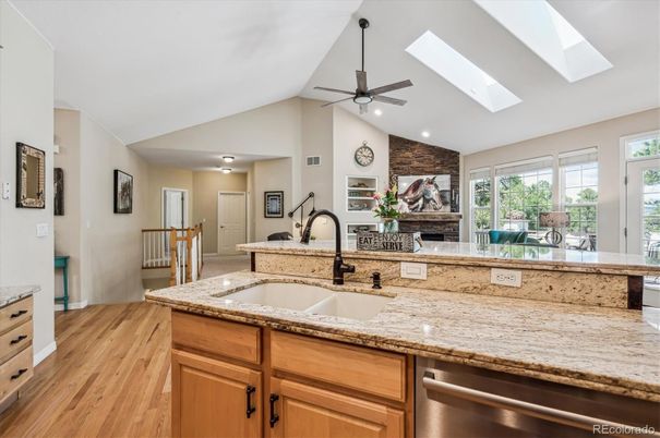 Fireplace, Interior, Kitchen, Recessed Lighting, Stone Walls, Wood Texture Flooring