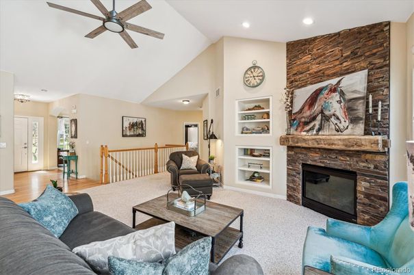 Fireplace, Interior, Living room, Recessed Lighting, Stone Walls, Wood Texture Flooring