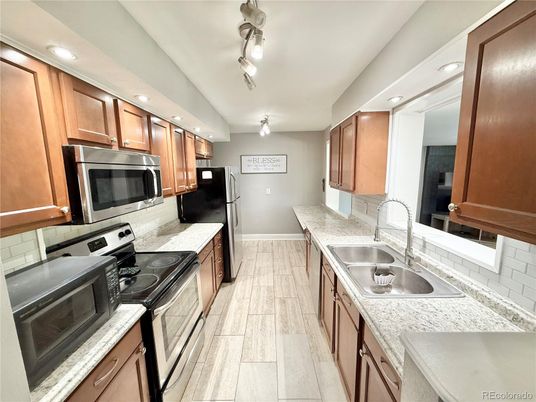 Interior, Kitchen, Recessed Lighting, Stainless Steel Appliances, Wood Texture Flooring