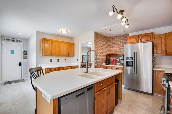 Interior, Kitchen, Recessed Lighting, Stainless Steel Appliances, Stone Walls