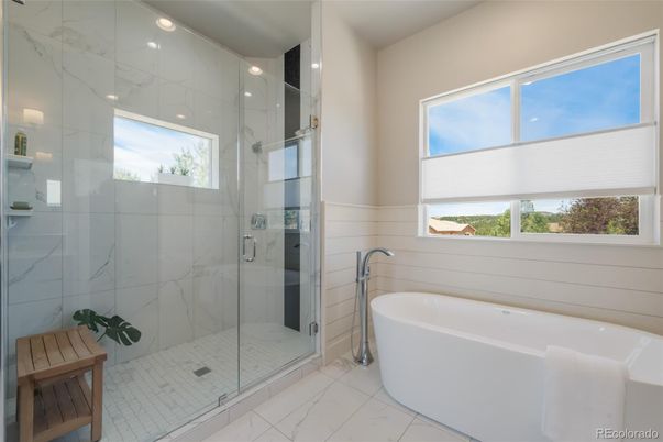 Bathroom, Free Standing Baths, Glass Shower, Interior, Marble, Marble Walls, Recessed Lighting