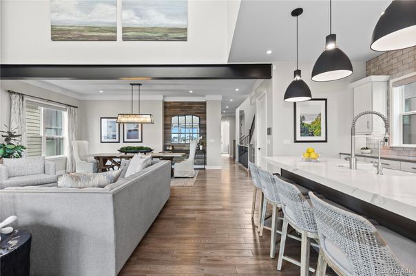Dining room, Interior, Kitchen, Living room, Pendant Lights, Recessed Lighting, Stainless Steel Appliances, Wood Texture Flooring
