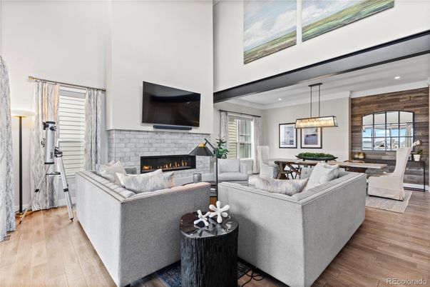 Dining room, Fireplace, Interior, Living room, Pendant Lights, Recessed Lighting, Wood Texture Flooring