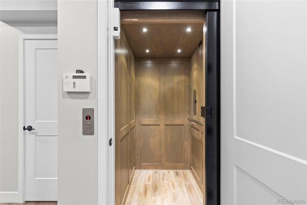 Elevator, Interior, Recessed Lighting, Wooden Ceilings, Wood Texture Flooring, Wooden Walls