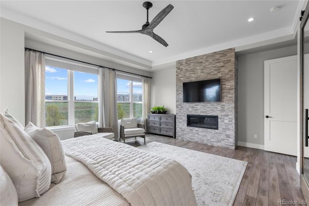 Bedroom, Fireplace, Interior, Recessed Lighting, Stone Walls, Wood Texture Flooring