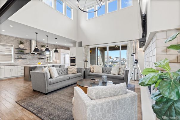 Interior, Kitchen, Living room, Pendant Lights, Recessed Lighting, Stainless Steel Appliances, Stone Walls, Wood Texture Flooring