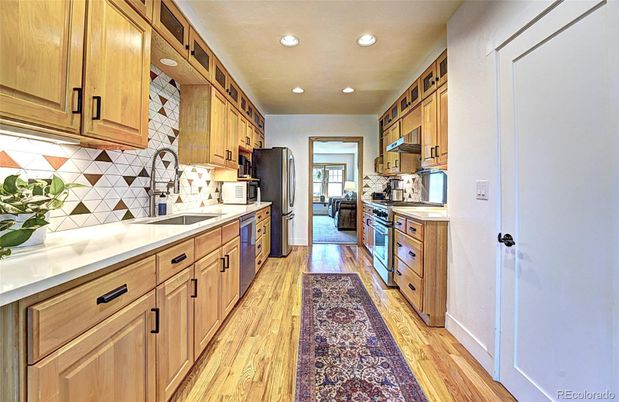 Interior, Kitchen, Recessed Lighting, Stainless Steel Appliances, Wood Texture Flooring