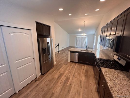 Interior, Kitchen, Pendant Lights, Recessed Lighting, Stainless Steel Appliances, Wood Texture Flooring