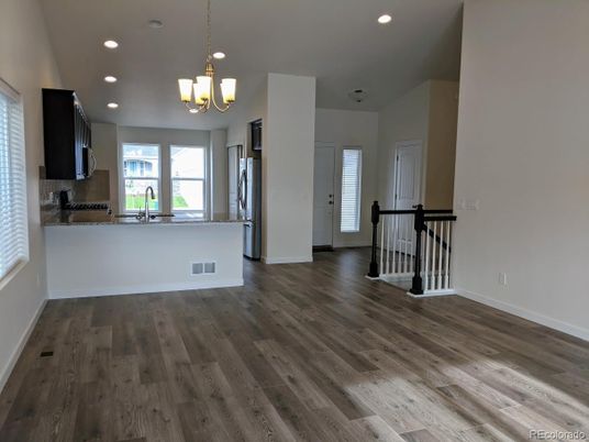 Chandelier, Interior, Kitchen, Pendant Lights, Recessed Lighting, Stainless Steel Appliances, Wood Texture Flooring