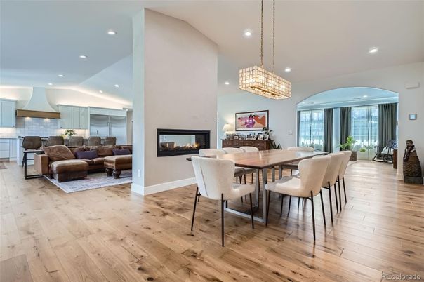 Chandelier, Dining room, Fireplace, Interior, Kitchen, Living room, Pendant Lights, Recessed Lighting, Wood Texture Flooring