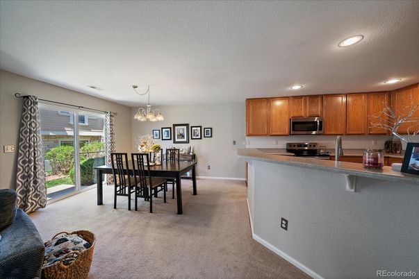 Chandelier, Dining room, Interior, Kitchen, Recessed Lighting, Stainless Steel Appliances