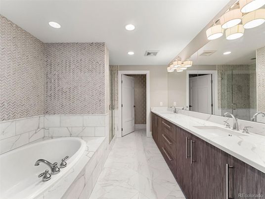 Bathroom, Dual Sink Vanities, Glass Shower, Interior, Marble, Recessed Lighting