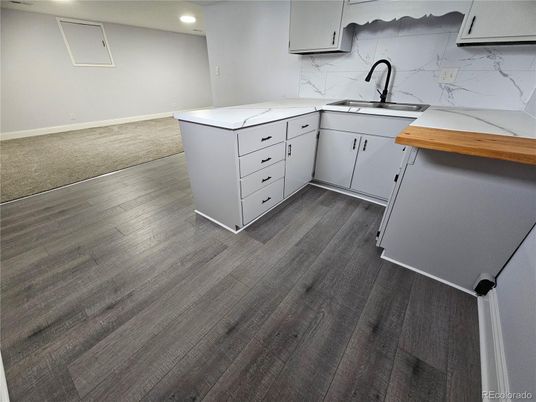 Interior, Kitchen, Marble Walls, Recessed Lighting, Wood Texture Flooring