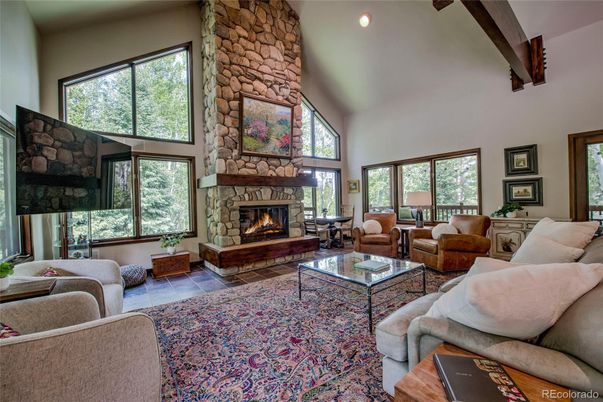 Fireplace, Interior, Living room, Recessed Lighting, Stone Walls, Wooden Beams