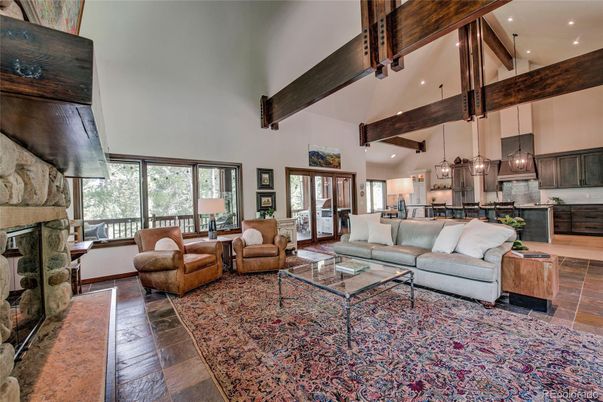 Fireplace, Interior, Kitchen, Living room, Pendant Lights, Recessed Lighting, Stainless Steel Appliances, Wooden Beams