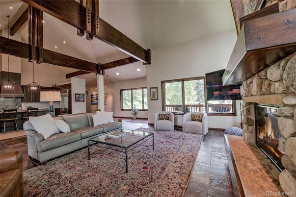 Dining room, Fireplace, Interior, Kitchen, Living room, Pendant Lights, Recessed Lighting, Stone Walls, Wooden Beams