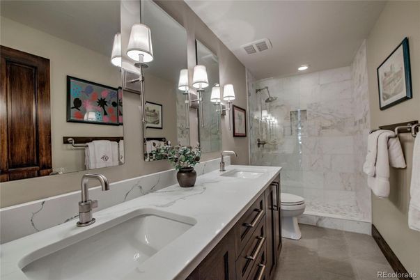 Bathroom, Dual Sink Vanities, Glass Shower, Interior, Marble Walls, Recessed Lighting