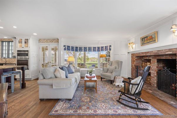 Fireplace, Interior, Kitchen, Living room, Recessed Lighting, Stainless Steel Appliances, Stone Walls, Wood Texture Flooring