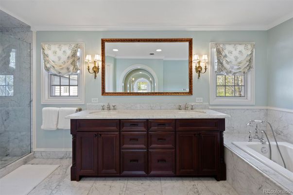 Bathroom, Dual Sink Vanities, Glass Shower, Interior, Marble, Marble Walls, Recessed Lighting