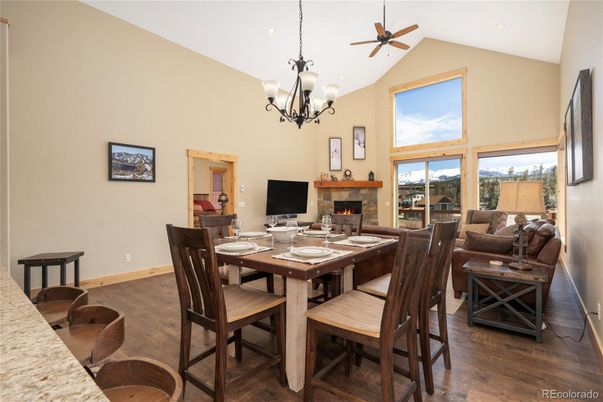 Chandelier, Dining room, Fireplace, Interior, Living room, Recessed Lighting, Wood Texture Flooring