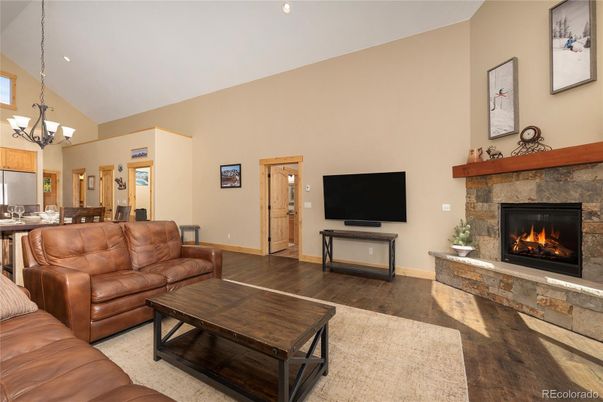 Chandelier, Dining room, Fireplace, Interior, Kitchen, Living room, Recessed Lighting, Wood Texture Flooring