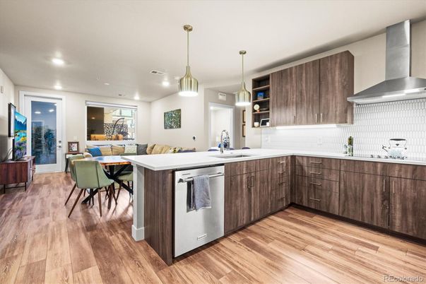 Dining room, Interior, Kitchen, Pendant Lights, Recessed Lighting, Stainless Steel Appliances, Wood Texture Flooring