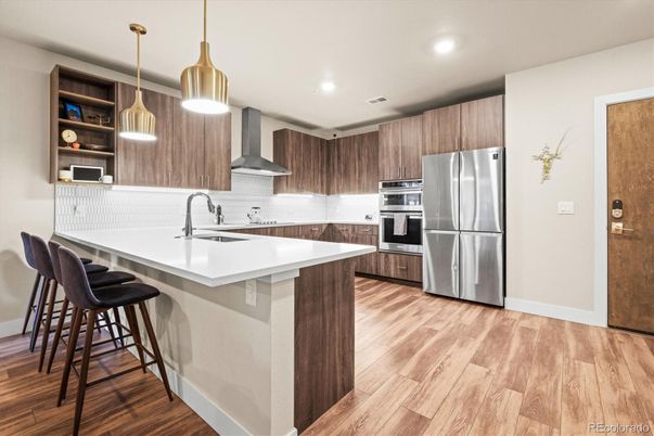 Interior, Kitchen, Pendant Lights, Recessed Lighting, Stainless Steel Appliances, Wood Texture Flooring