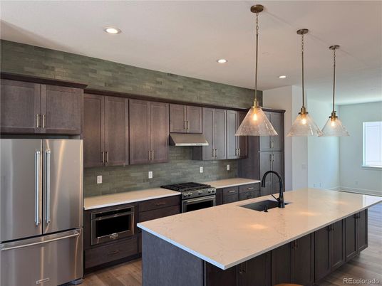 Interior, Kitchen, Pendant Lights, Recessed Lighting, Stainless Steel Appliances, Wood Texture Flooring