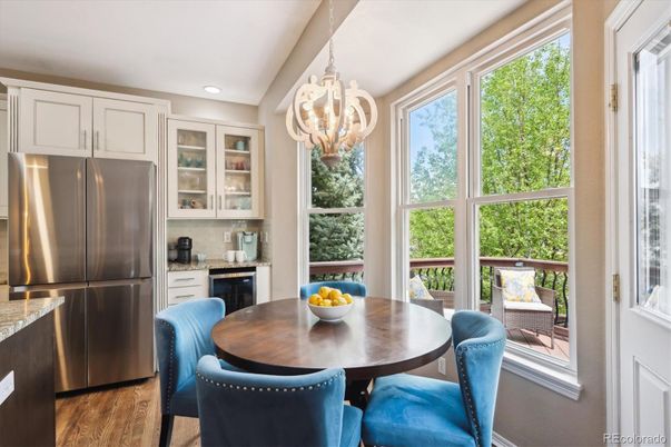 Chandelier, Dining room, Interior, Kitchen, Recessed Lighting, Stainless Steel Appliances, Wood Texture Flooring