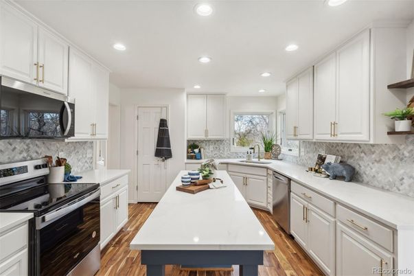 Interior, Kitchen, Recessed Lighting, Stainless Steel Appliances, Wood Texture Flooring