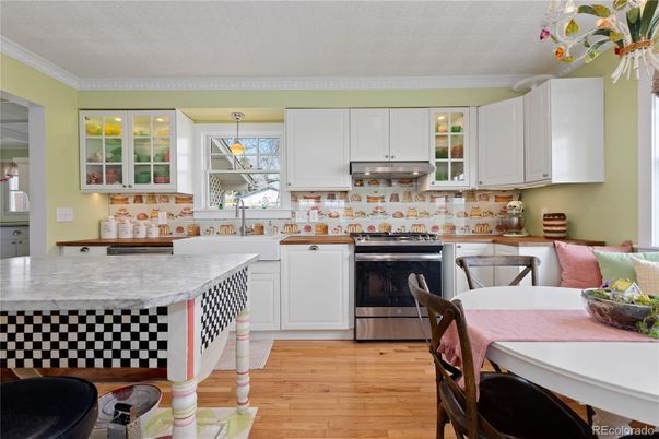 Dining room, Interior, Kitchen, Pendant Lights, Stainless Steel Appliances, Wood Texture Flooring