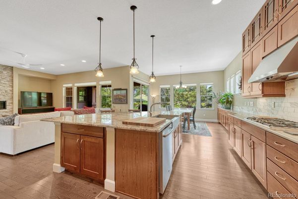 Dining room, Interior, Kitchen, Living room, Pendant Lights, Recessed Lighting, Stainless Steel Appliances, Wood Texture Flooring